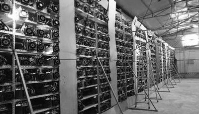 A vast mining farm showcasing rows of mining machines indicates the scale and infrastructure required for efficient cryptocurrency mining.